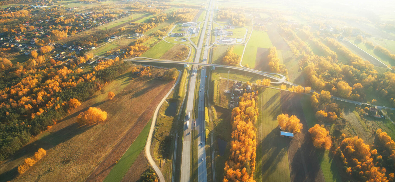 Drone view of highway in autumn scenery